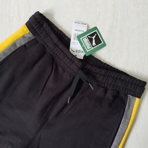 Brand new Puma sweatpants for kid's or women. Black with yellow and gray stripes